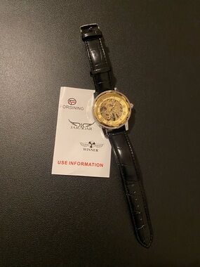 WINNER Black Leather Strap Skeleton Watch with Gold Dial